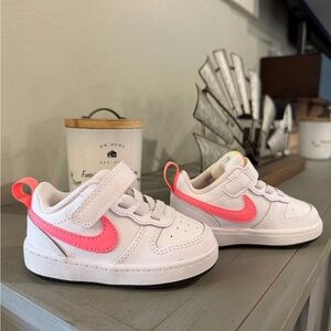 Nike Toddler White Sneakers with Pink Swoosh